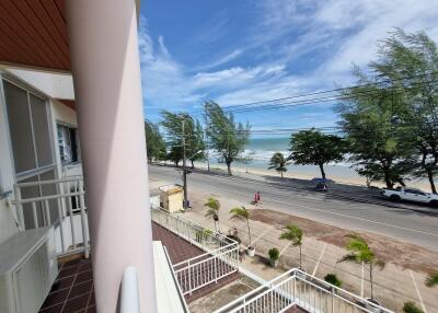 View from balcony overlooking the beach and street