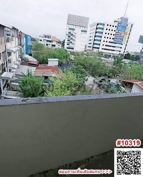 Urban view from a high-rise building balcony