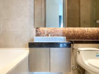 Modern bathroom interior with mirror and ceramic fixtures