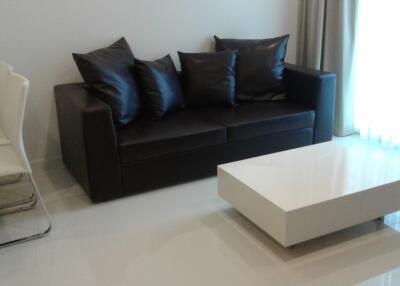 Modern living room interior with comfortable sofa and sleek coffee table