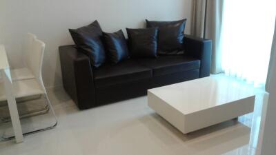 Modern living room interior with comfortable sofa and sleek coffee table