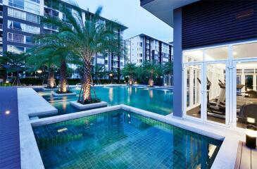 Luxurious apartment complex with swimming pool and gym