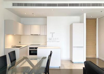 Modern kitchen area with dining table