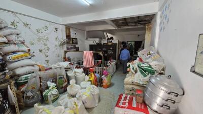 Cluttered storage room with miscellaneous items