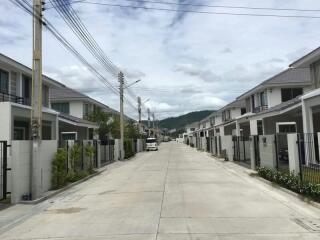 Row of modern houses along a quiet residential street