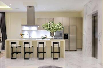 Modern kitchen with a large island and marble floors