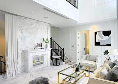 Elegant and spacious living room with high ceilings and luxurious decor