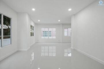 Spacious and Bright Empty Room with Shiny Tile Flooring