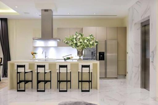 Modern kitchen with island and stainless steel appliances