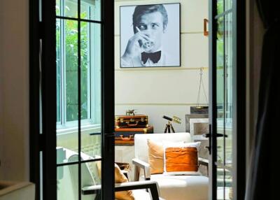 Elegant living room interior viewed through French doors