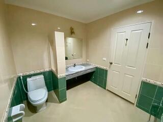Spacious bathroom with modern fixtures