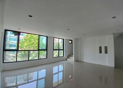 Spacious and bright living room with large windows