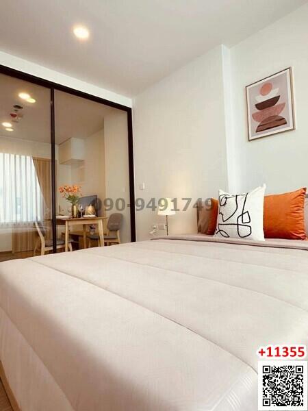 Modern bedroom interior with large bed and sliding glass door