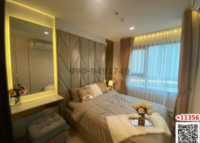 Cozy modern bedroom with ample lighting and elegant design