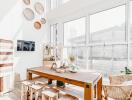 Bright and modern dining area with large windows and stylish decor
