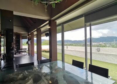 Elegant dining area with modern furniture and panoramic views