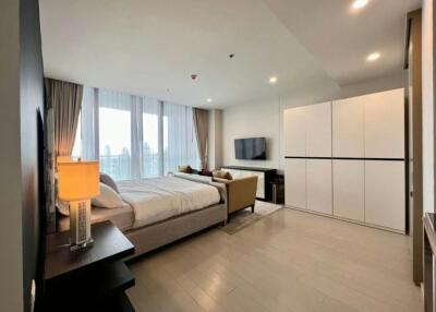 Spacious bedroom with modern design and large window