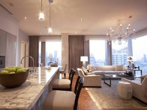 Spacious modern living room with city skyline view