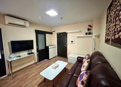 Cozy living room with modern furnishings and warm lighting