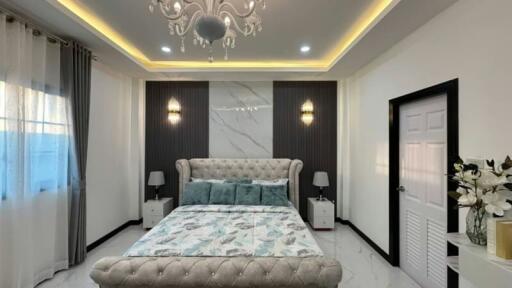 Contemporary bedroom with elegant design and decorative lighting