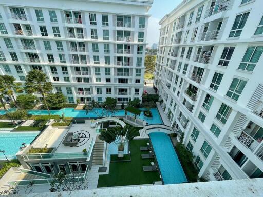 Apartment complex with swimming pool and outdoor amenities