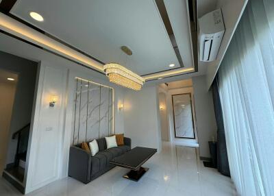 Elegant living room with chandelier and modern design