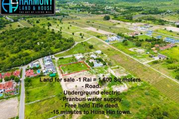 Aerial view of land for sale in a green residential development
