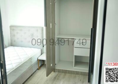 Modern bedroom interior with an open wardrobe