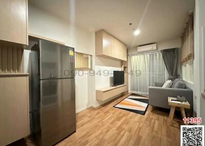 Modern studio apartment interior with combined living room and kitchen area