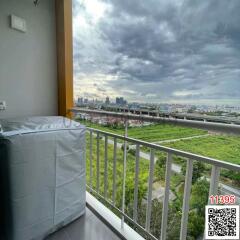 City-view balcony with overcast sky
