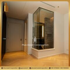 hallway with glass partition and wooden floor