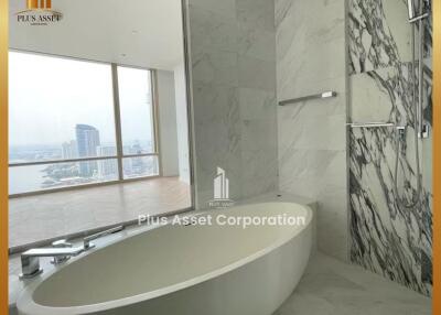 Luxurious modern bathroom with large windows and city view
