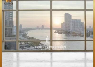 Spacious interior view from a high-rise building overlooking the city river and skyline