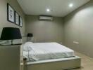 Modern and minimalistic bedroom with elegant lighting