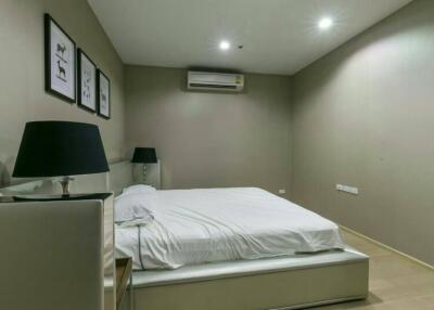 Modern and minimalistic bedroom with elegant lighting