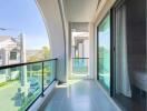 Spacious balcony with a view and sliding glass doors