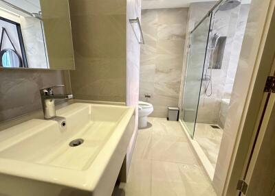 Modern bathroom with large walk-in shower and sleek design