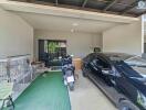 Spacious garage with vehicles and storage space