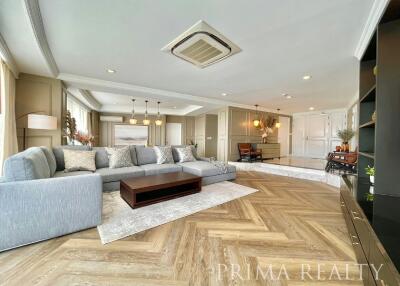Spacious and elegantly furnished living room with modern amenities