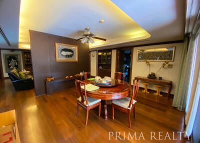 Spacious living room with dining area and modern furnishings