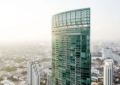 Modern skyscraper with glass facade in urban landscape