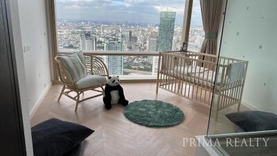 High-rise bedroom with city view and stylish decor