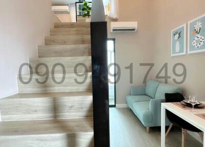 Modern staircase leading to the upper level in a contemporary home interior