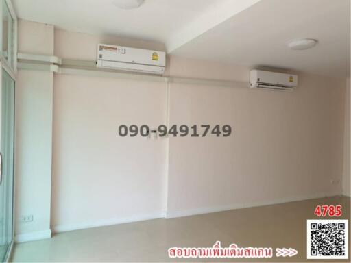 Spacious and bright empty room with air conditioners