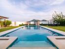 Swimming pool with mountain view and landscaped garden at luxury property