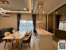 Modern living and dining room area with elegant furniture and ample lighting