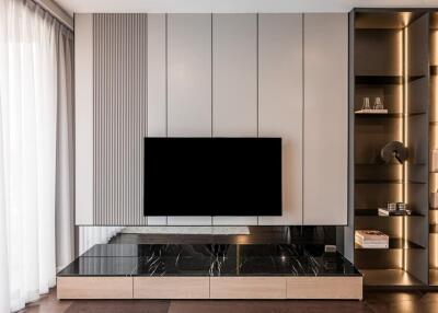 Modern living room with wall-mounted TV and shelving unit