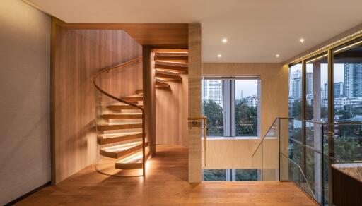 Modern staircase in a luxurious home interior with city view