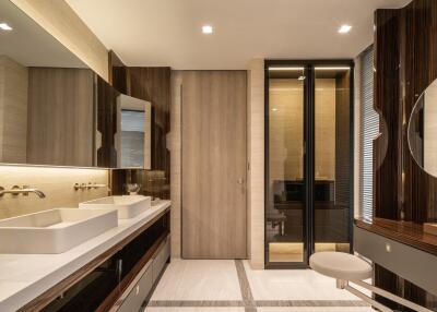 Modern bathroom with dual sinks and wooden accents