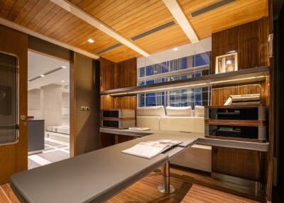 Modern home office interior with wooden finishes and contemporary furniture